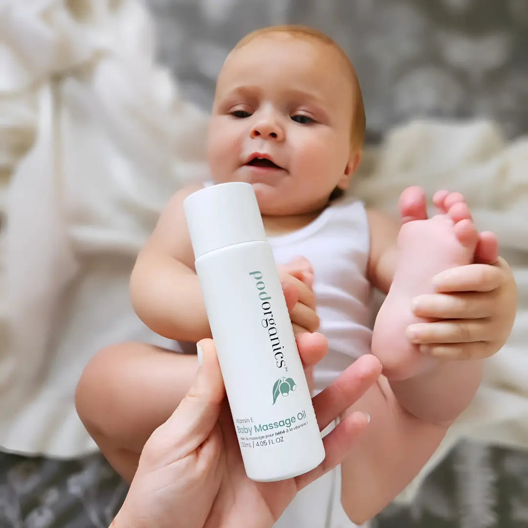 Mum with baby using Pod Organics baby oil