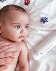 Baby after bath using Pod Organics Baby Lotion to keep skin soft and nourished