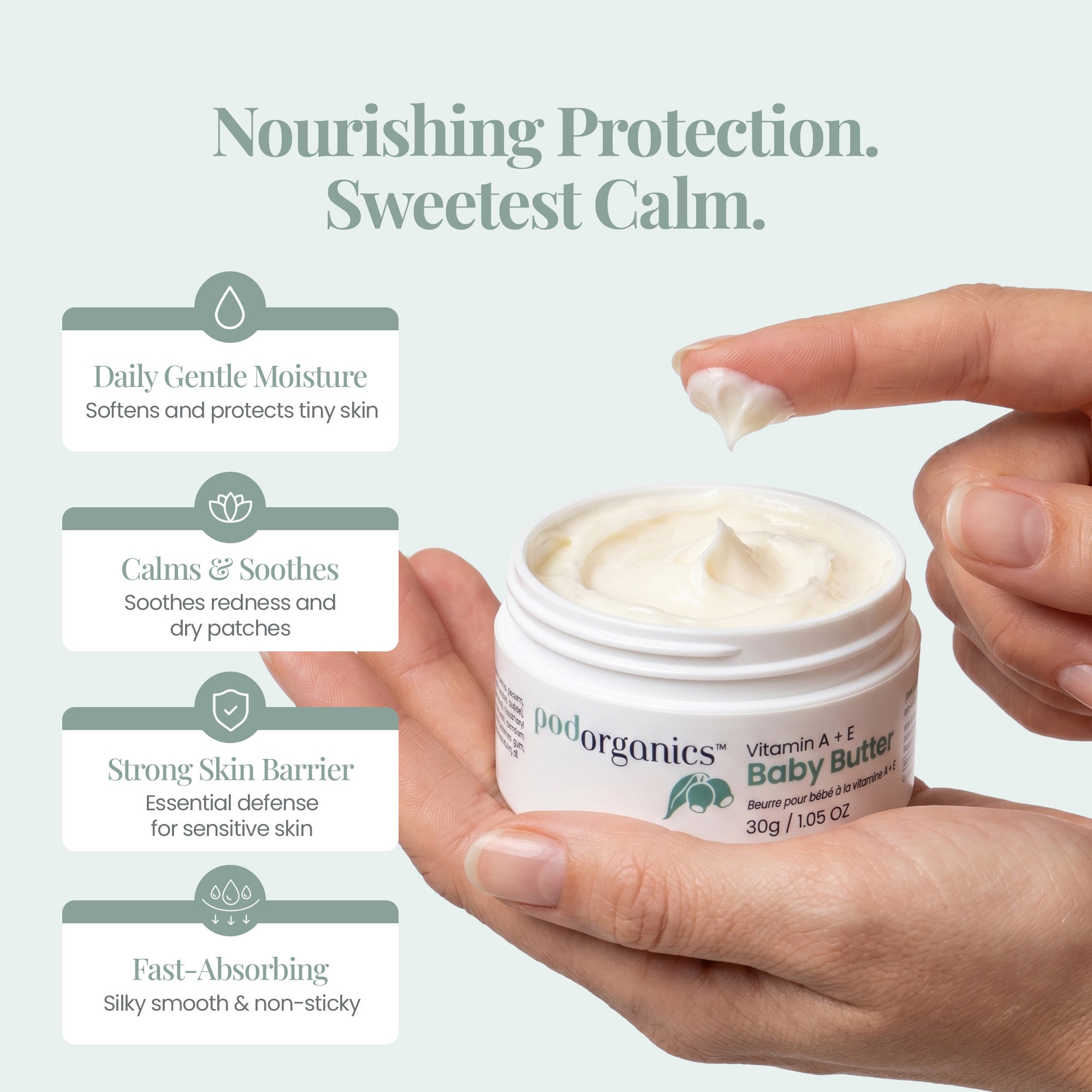 A jar of Pod Organics Vitamin A+E Baby Butter being applied by hand