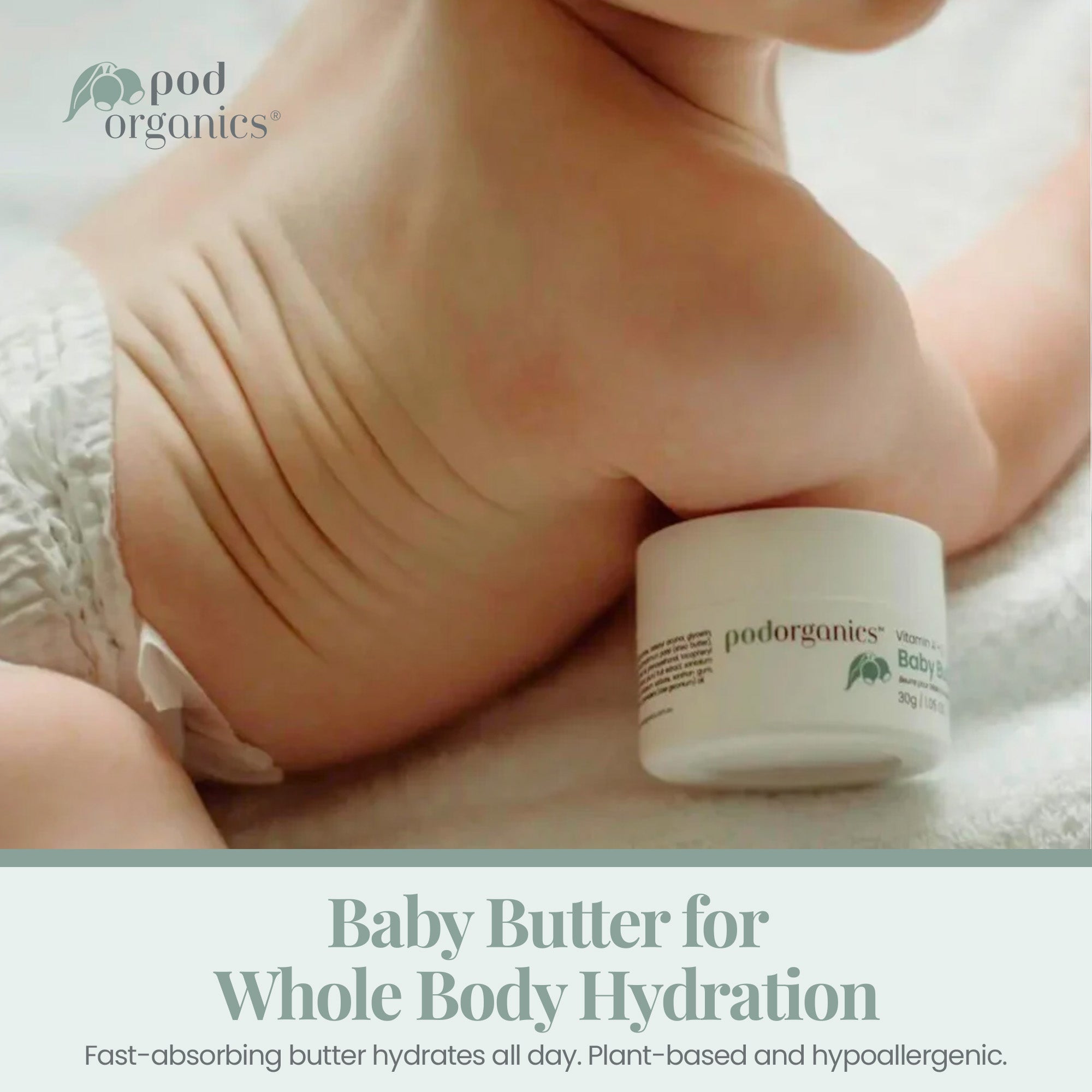 Pod Organics Vitamin A+E Baby Butter beside a baby resting on white bedding