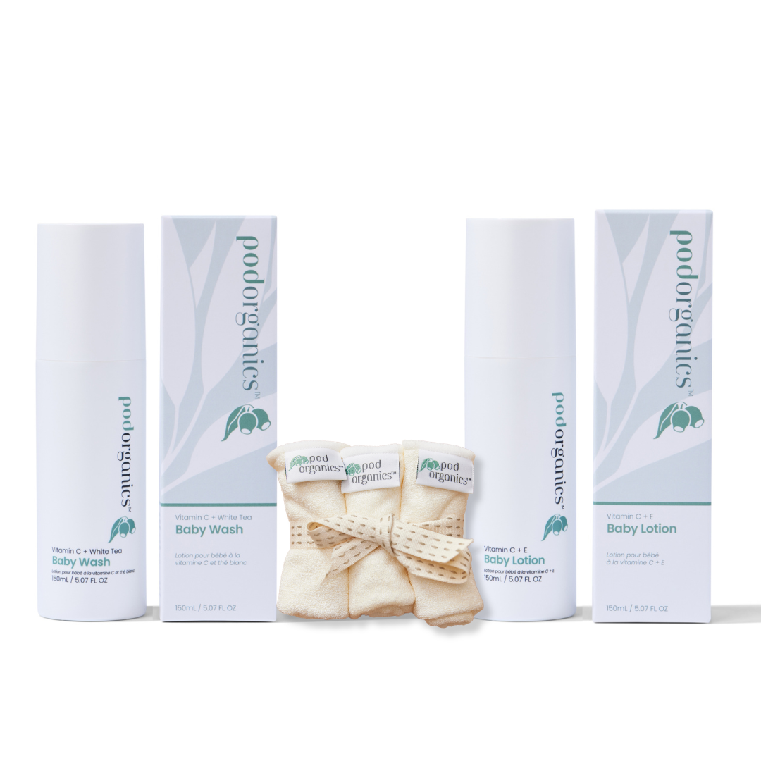 Pod Organics The First Bath Set with baby wash, baby lotion and bamboo wash cloths on a white background